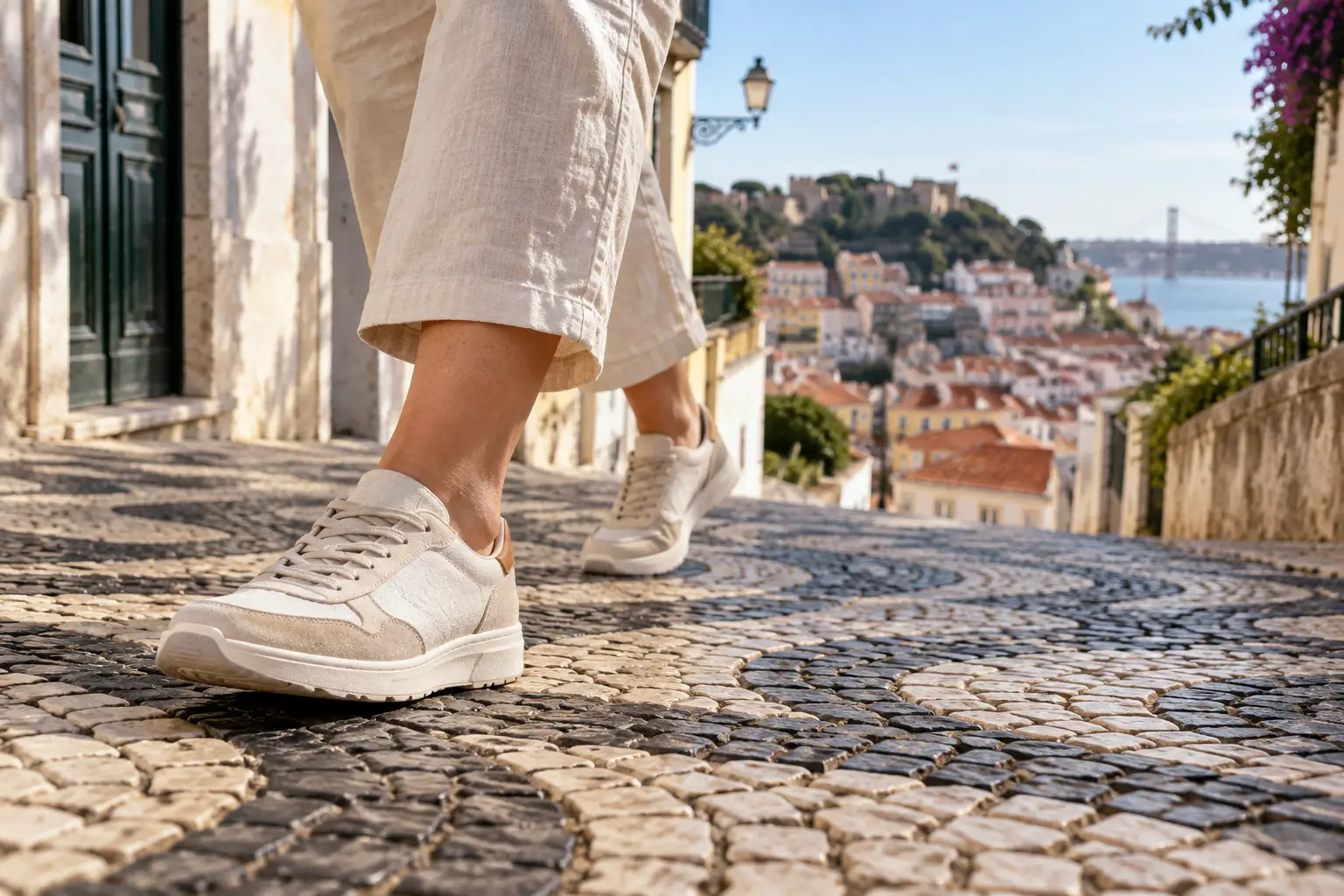 Comfortable walking shoes on a traditional Portuguese cobblestone street