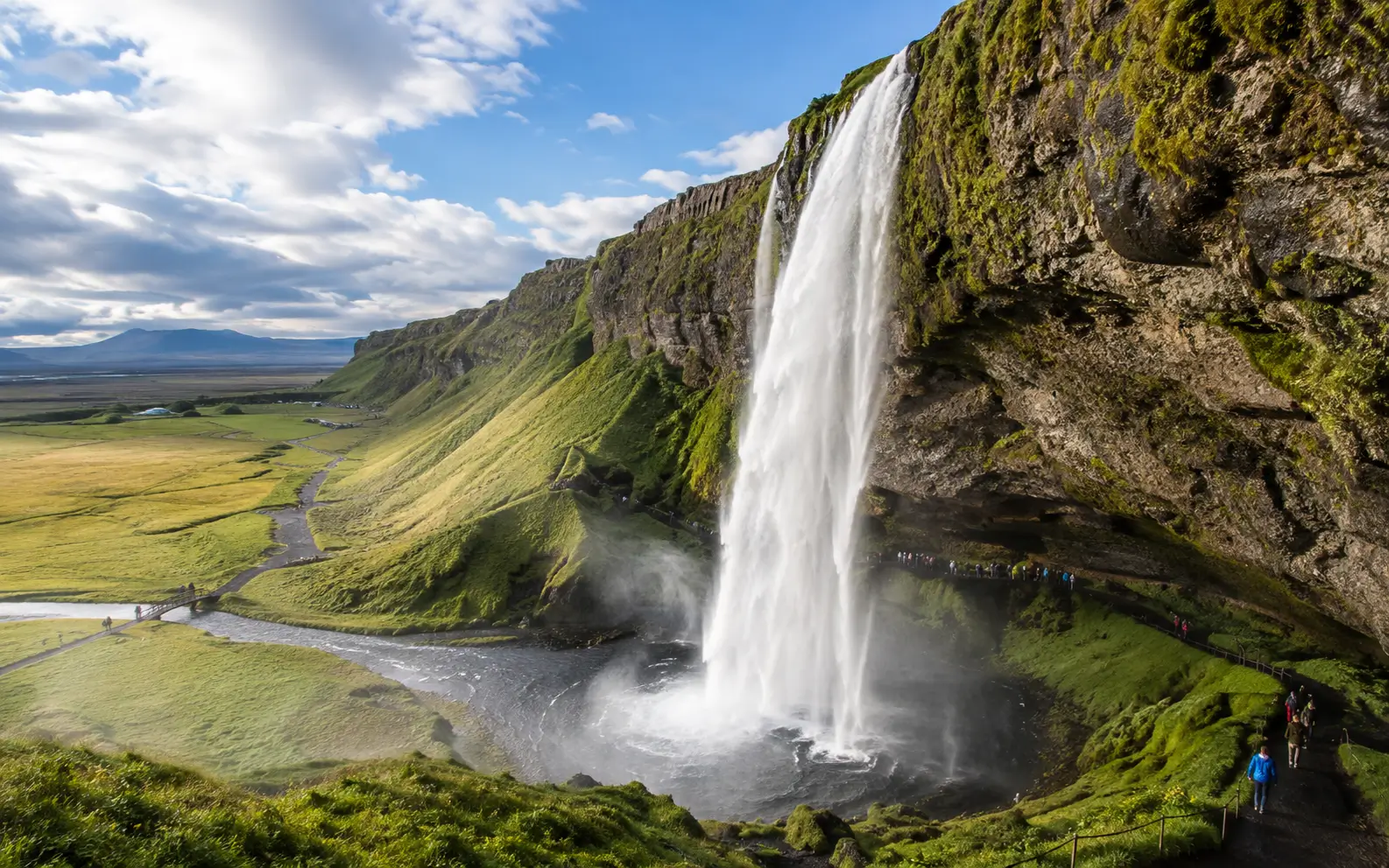 Seljalandsfoss waterfall on Iceland South Coast with the marked path
