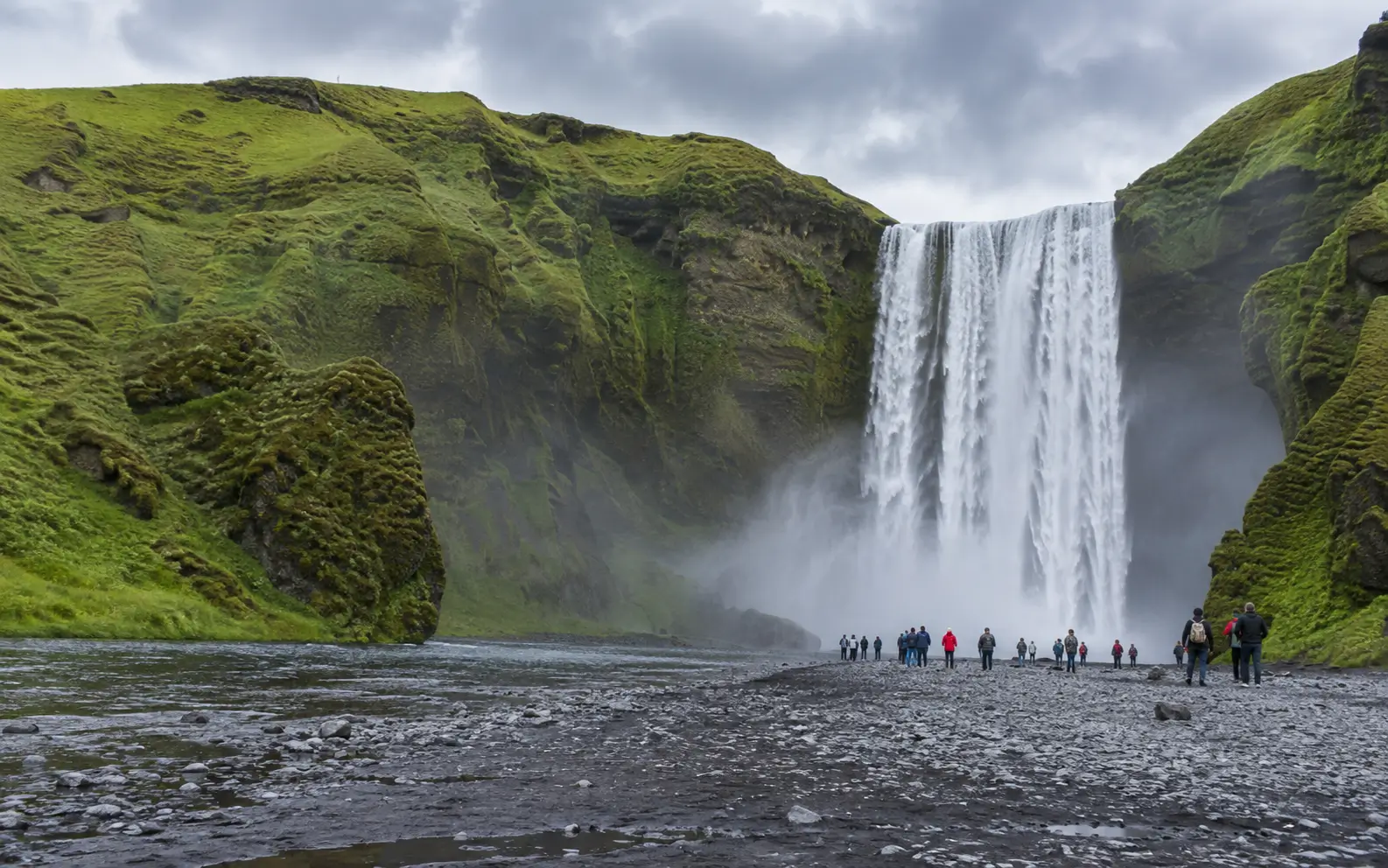 Skogafoss waterfall and its dramatic South Iceland landscape